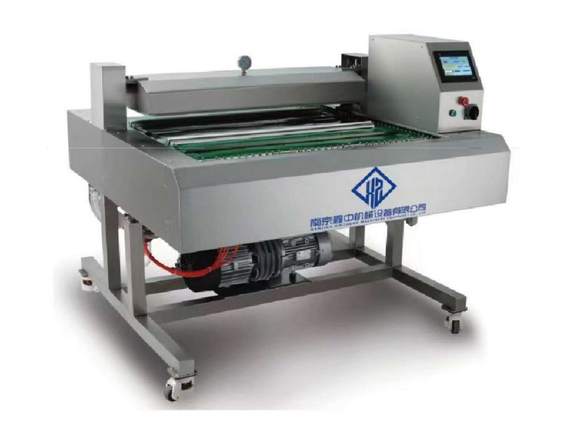 連續(xù)式翻滾真空包裝機(jī)